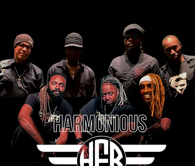 An image of seven of the Harmonious Funk members with the logo in front of them.