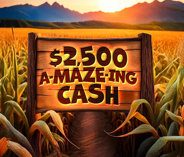 Promotion logo for $2,500 A-MAZE-ing Cash with a corn field and mountain range behind it.