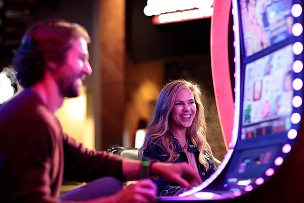 tulalip resort casino gaming man and woman playing slots